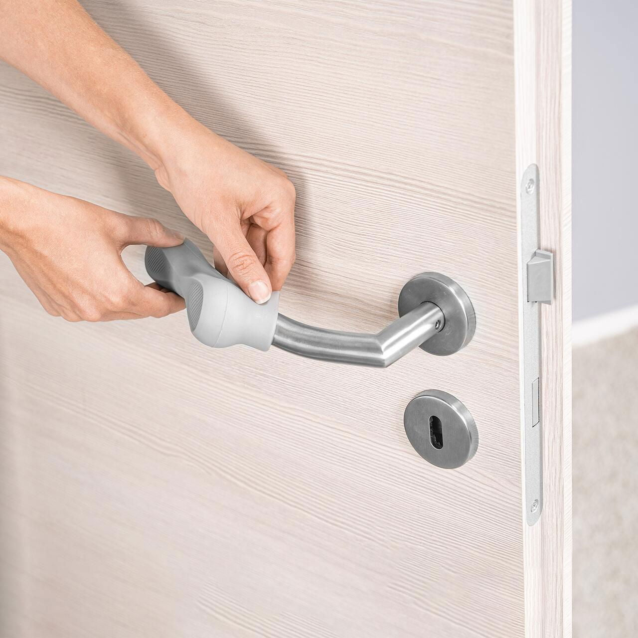 Set 4 protectii clanta usa, din silicon, acoperire completa, Reer HandleGuard 70091